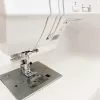 Šijací stroj SINGER Quantum Stylist 9960 — 600 vzorov stehov, 13 automatických programov gombíkovej dierky, systém voľného ramena