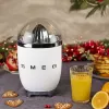 Elektrický lis na citrusy Smeg CJF11WHEU 70 W biela nehrdzavejúca oceľ
