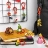 Backpack Buddies sada kľúčeniek Paladone Super Mario CDU s 24 kusmi – rôzne postavy, zberateľský doplnok