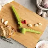 Ručný lis na cesnak Ototo Design Garligator zelená plast oceľ