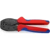 Krimpovacie kliešte Knipex PreciForce model 975236 SB — izolované rukoväte v čiernej, modrej a červenej