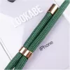 Obal na telefón na krk Lookabe pre iPhone 7/8 Plus — zlatý so zeleným pásikom