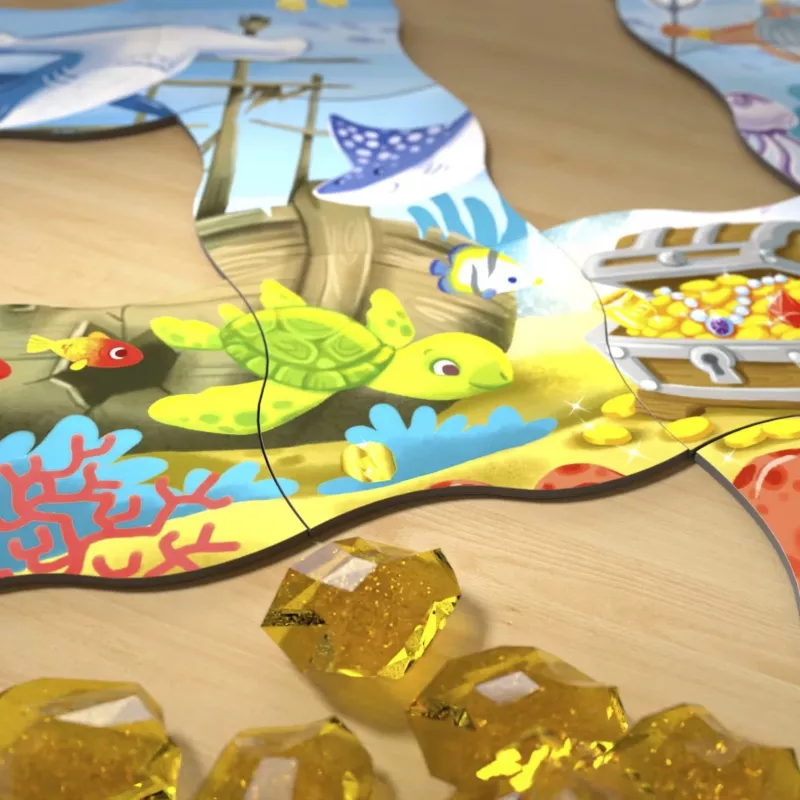 Hra sa stretáva s puzzle - Hľadanie pokladu v oceáne, stolová hra