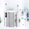 Oral-B iO6 elektrická zubná kefka s ústnou sprchou OxyJet, biela