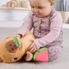 Hračkárske vodné prasiatko Fisher-Price Snuggly Snacky Capy 0,5 roka