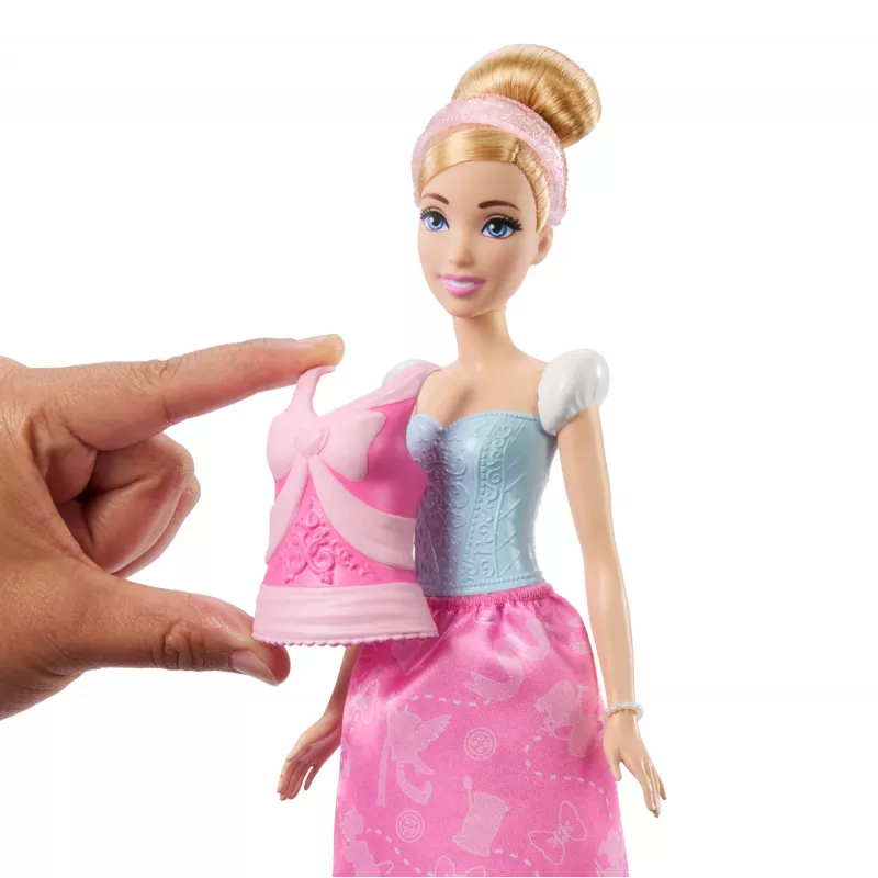 Disney Princess 2-in-1 príbehy Cinderella módna bábika s 2 nasadzovacími vrchnými dielmi, 2 sukňami a 9 doplnkami