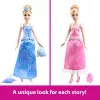 Disney Princess 2-in-1 príbehy Cinderella módna bábika s 2 nasadzovacími vrchnými dielmi, 2 sukňami a 9 doplnkami