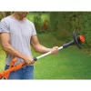Black & Decker ST182320-QW akumulátorový strunový vyžínač, 18 V, 2,0 Ah Li-Ion, šírka kosenia 25 cm, s akumulátorom a nabíjačkou, oranžový/čierny