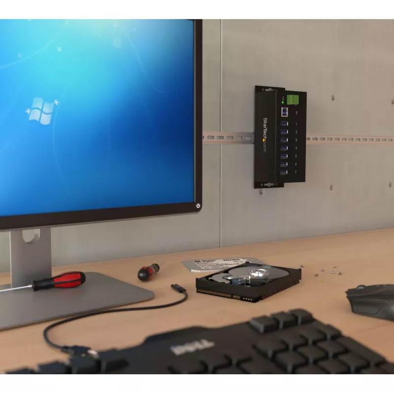 StarTech.com 7-portový priemyselný USB 3.0 hub s ESD ochranou~7-portový USB 3.0 hub (5Gbps) - priemyselný kovový USB-A hub s ESD ochranou a 350W prepäťovou ochranou - montáž na DIN lištu, stenu alebo stôl - TAA-kompatibilný USB rozširujúci hub