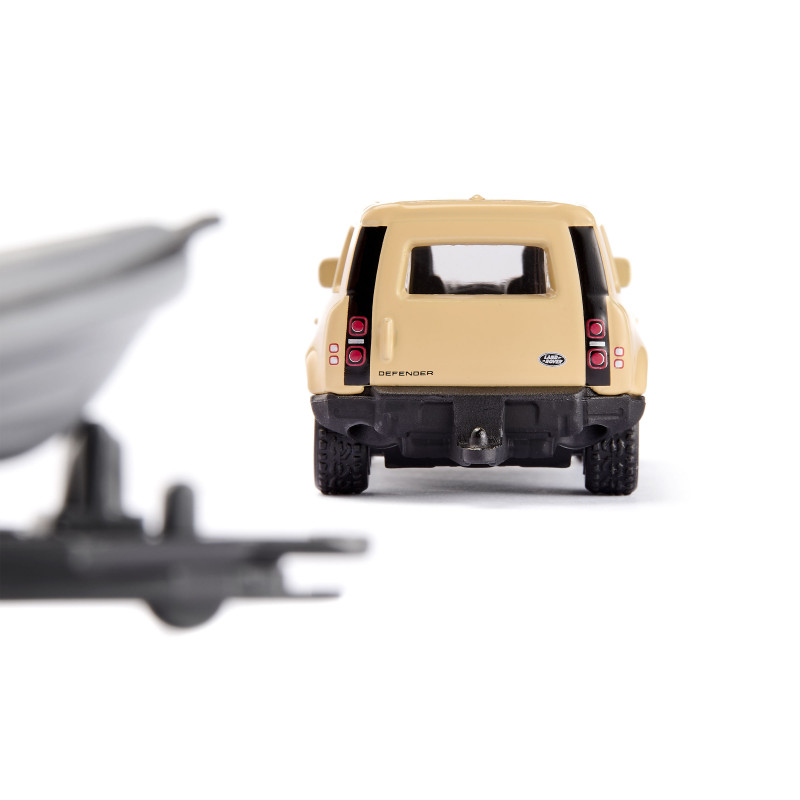 SIKU Blister Land Rover Defender Safari s člnom