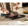 Joseph Joseph Cut&Carve Plus veľká čierna doska na krájanie s integrovanými hrotmi na pridržanie mäsa