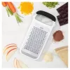 OXO Good Grips 2-in-1 udržiavač byliniek a zeleniny biely