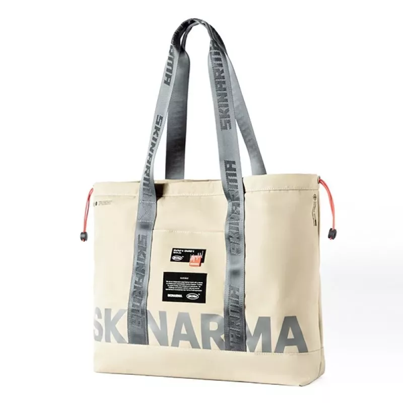 Skinarma Fardel sling taška Ivory