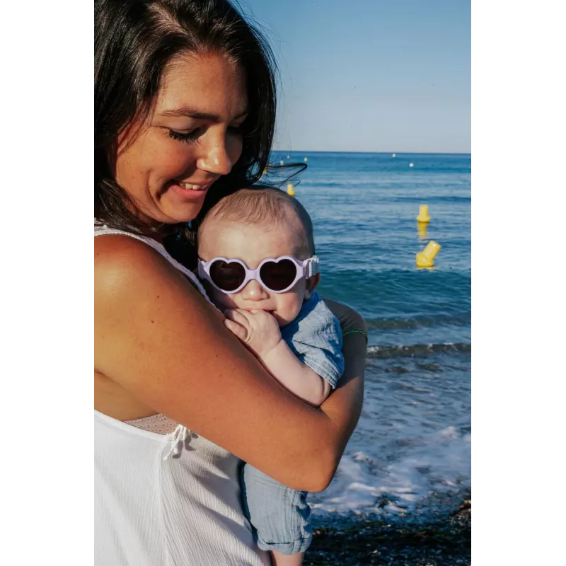 Beaba Baby Heart detské slnečné okuliare s elastickou gumičkou 0-9 mesiacov fialové