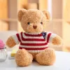 LEAN TOYS plyšový maskot maznáčik medvedík v pruhovanom tričku krémová 32 cm