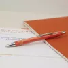 Schneider Epsilon guľôčkové pero oranžové s modrým atramentom 138606