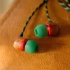 Marley Smile Jamaica káblové slúchadlá do uší s mikrofónom a USB-C, 9 mm meniče – Rasta (EM-JE042-RA)