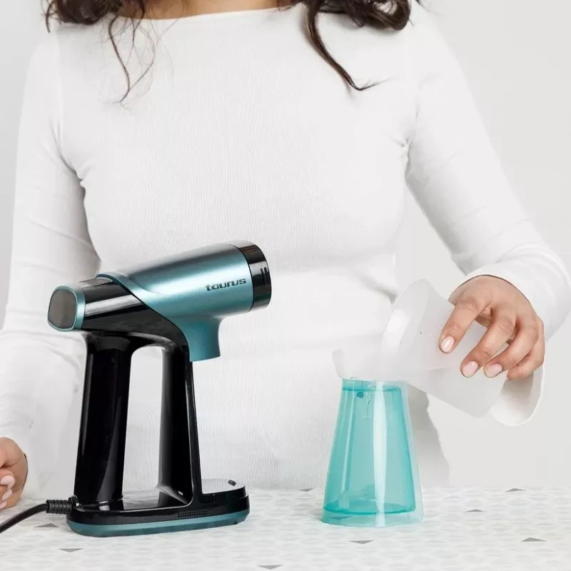 Taurus Sliding Care ProSuction parný žehliaci hladidlo 1550 W 180 ml tyrkysová